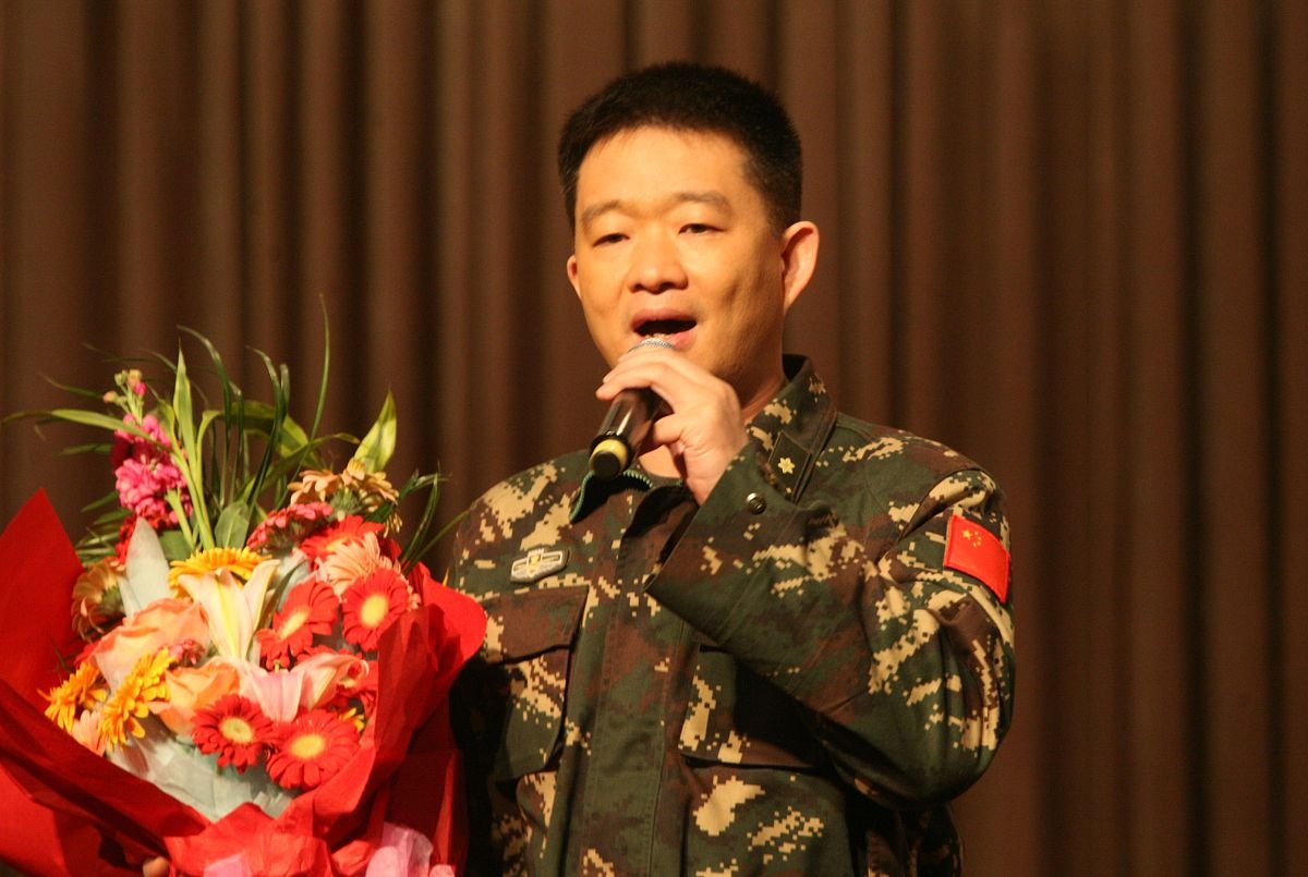 歌曲军中绿花原唱是谁